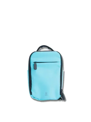 Bold Mimic: Multi-Carry Sling/Backpack in Bold Turqouise Color