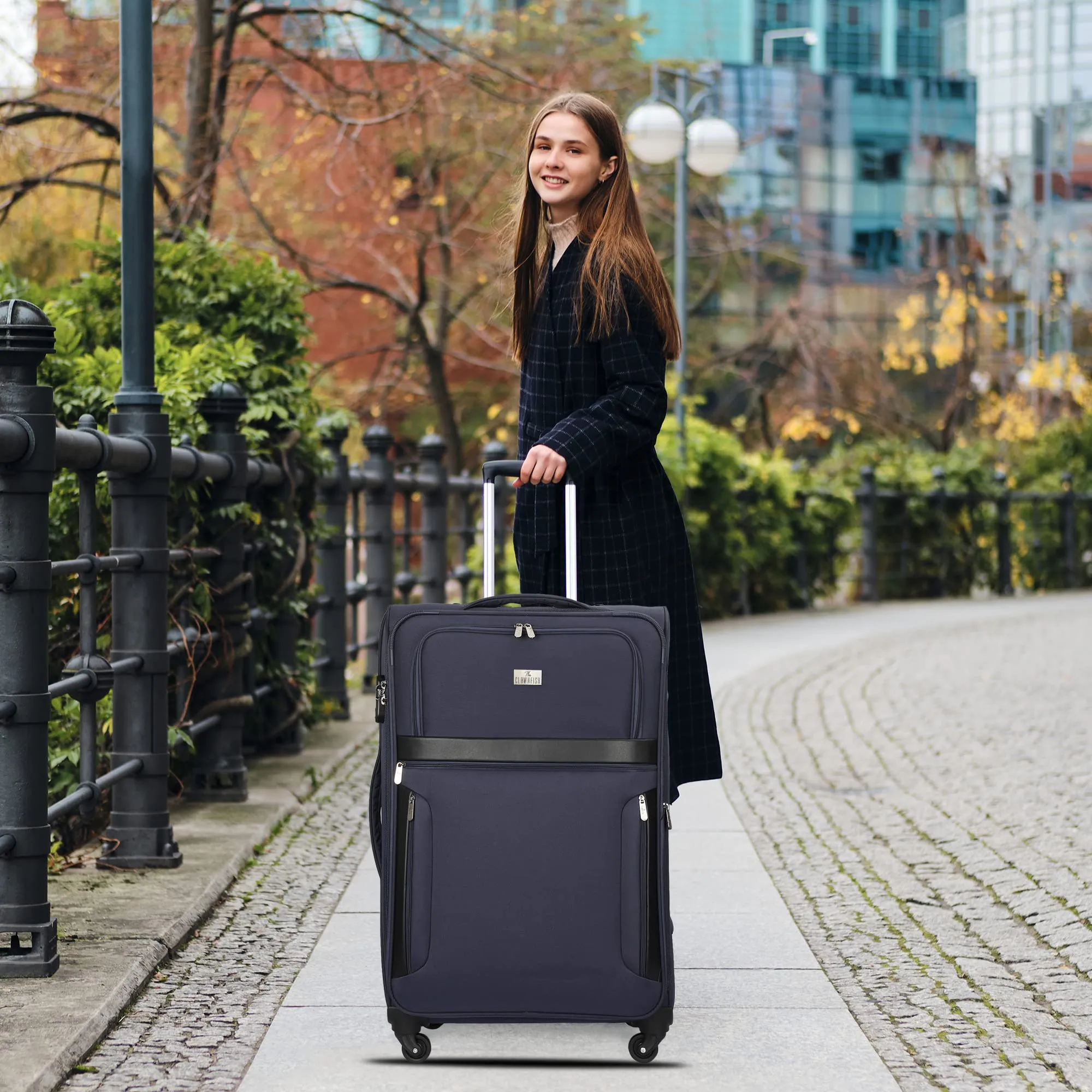 THE CLOWNFISH Faramund Series Luggage Polyester Softsided Suitcase Four Wheel Trolley Bag- Navy Blue (Small size- 56 cm)